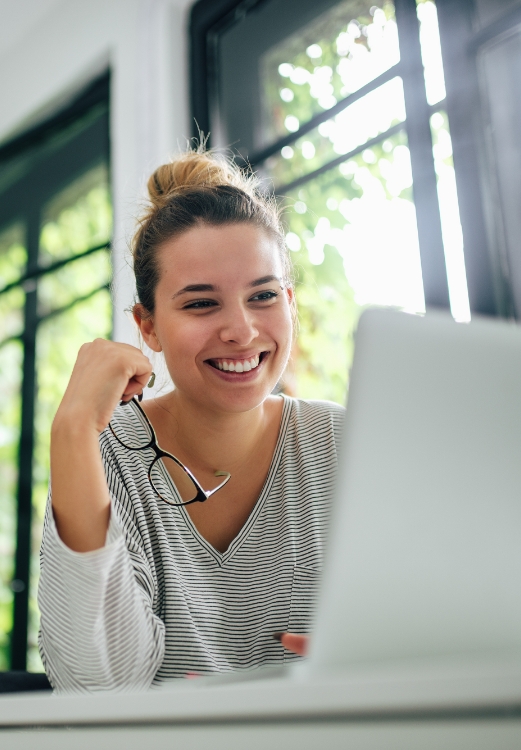 The Lindsey Family Dental team smiling in a grassy field