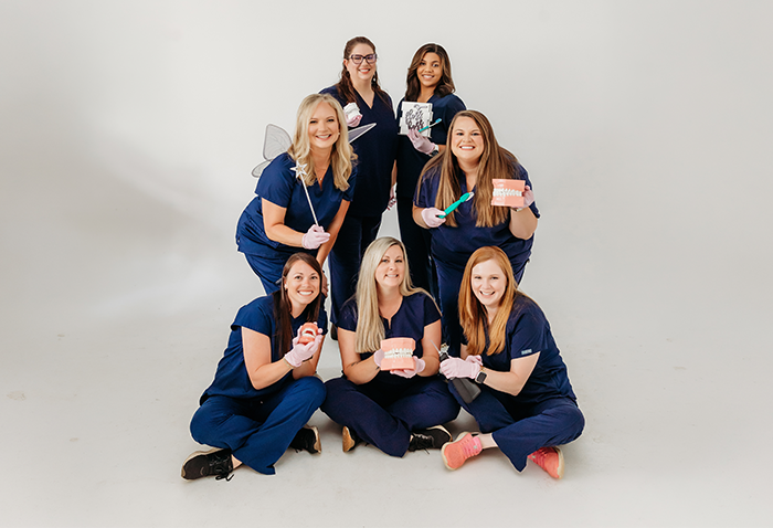 The Lindsey Family Dental team smiling outdoors
