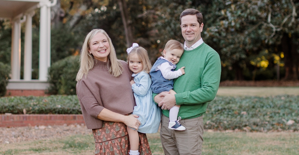 Doctor Hill Lindsey with her husband and young daughter in bumble bee outfits